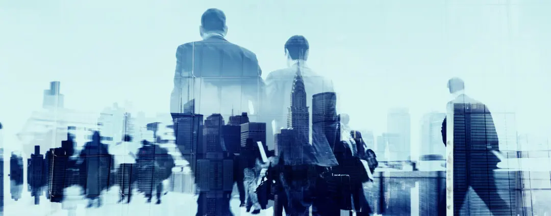 Business people walking through a city